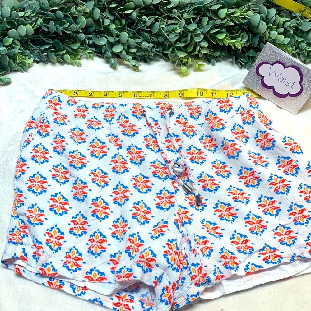 2 pair shorts. Black and multi. Size M/L